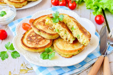 Pancakes on kefir with green onion and egg