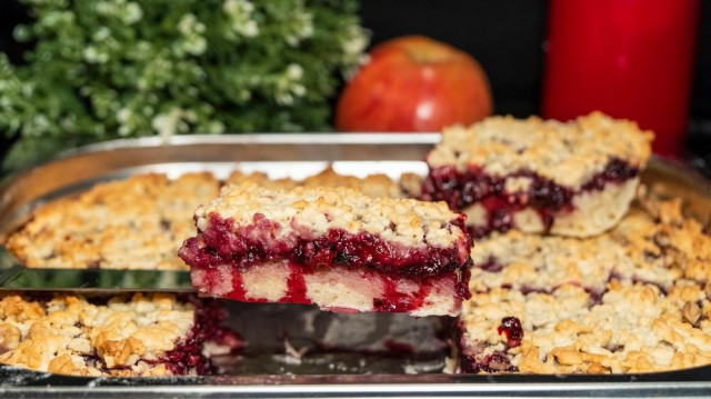 Shortbread pie with jam and nuts