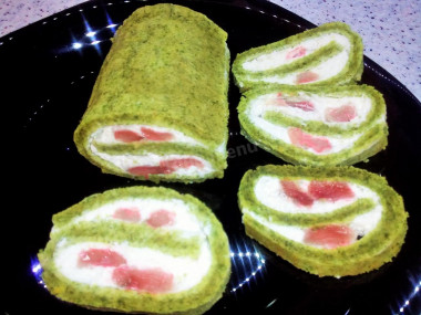 Snack for the festive table-emerald roll with red fish