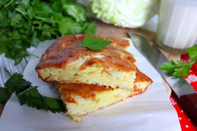 Aspic cabbage and carrot pie made of dough with mayonnaise