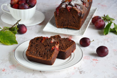 Chocolate cupcake with milk and plums