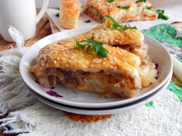 Unsweetened Strudel roll with potatoes, meat and cabbage