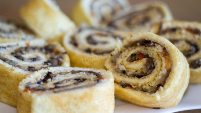 Snack - sponge roll with mushrooms