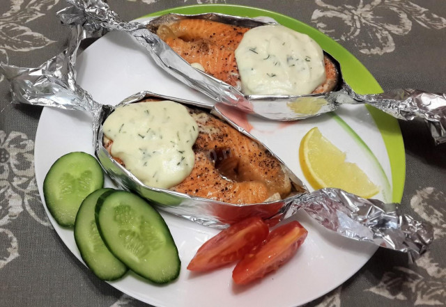 Salmon in a boat with cream sauce