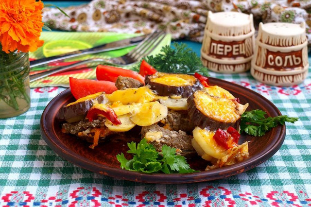 Veal with eggplant, potatoes and other vegetables