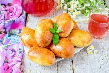 Pies with jam in the oven made of yeast dough