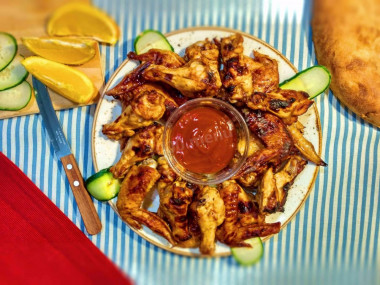 Chicken wings with honey malt and tkemali