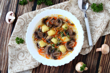 Mushroom soup of champignons with vermicelli and potatoes