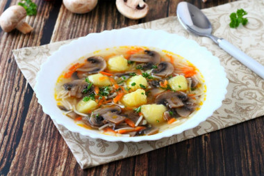 Mushroom soup of champignons with vermicelli and potatoes