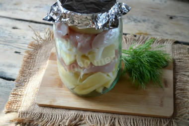 Chicken breasts with potatoes in a jar