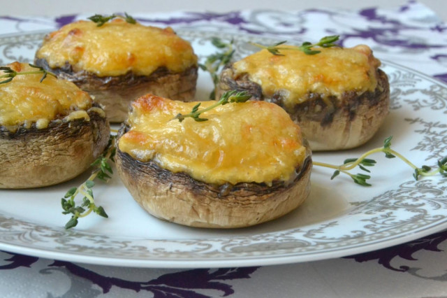 Baked champignons with eggplant and cheese