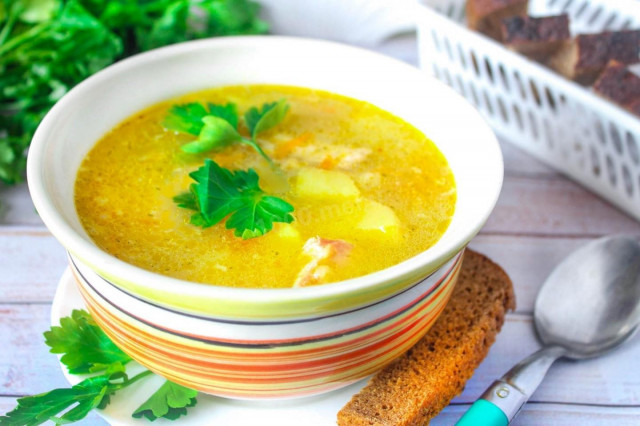 Rice soup with chicken and potatoes