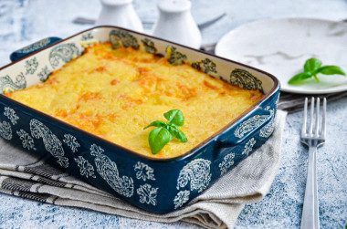 Potato casserole with minced meat and cheese in oven