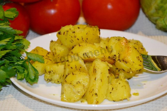 Baked potatoes with aromatic herbs