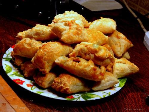 Puff pastry pies with mushrooms, onions, cabbage and egg