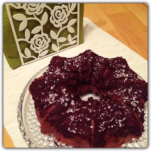 Chocolate cupcake with cherries and nuts