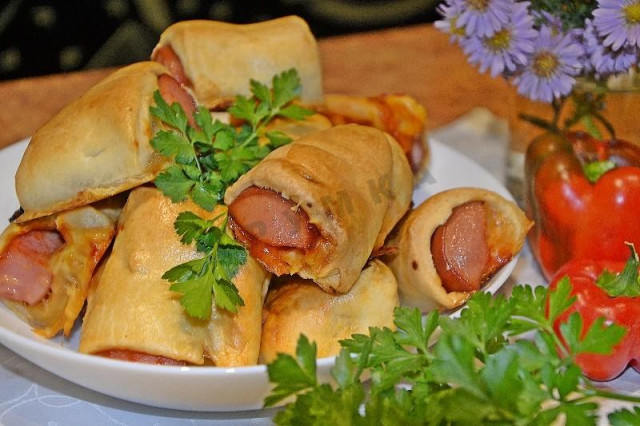 Rolls with cheese and sausages