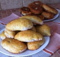 Yeast pies stuffed with dried mushrooms and onions