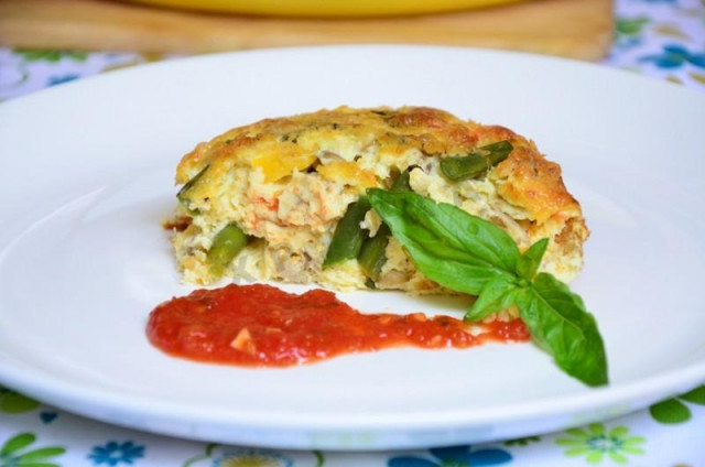 Frittata with string beans cherry tomatoes and mushrooms