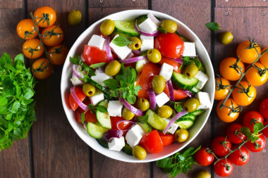 Greek salad with sirtaki cheese and tomatoes classic