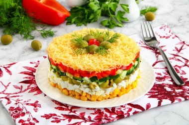 Salad with egg cheese corn and cucumber