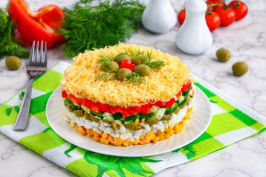 Salad with egg cheese corn and cucumber