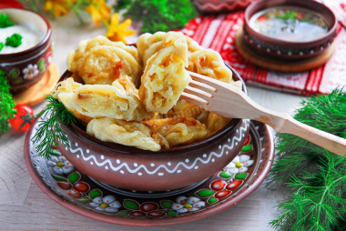 Dumplings with potatoes and fried onions