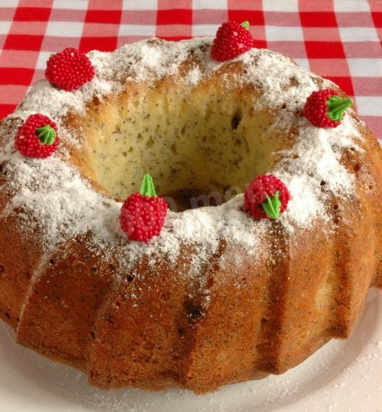 Cupcake with poppy seeds and cherries