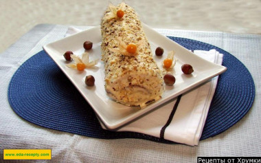 Sponge roll with cottage cheese filling and nuts