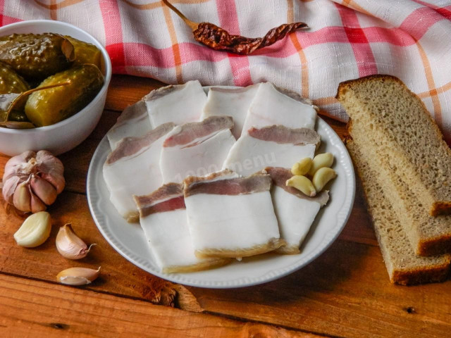 Lard in a jar with garlic in brine