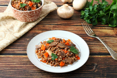 Buckwheat with mushrooms, carrots and onion