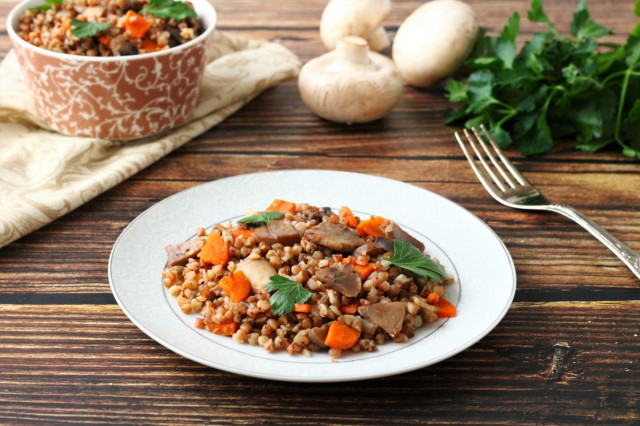 Buckwheat with mushrooms, carrots and onion