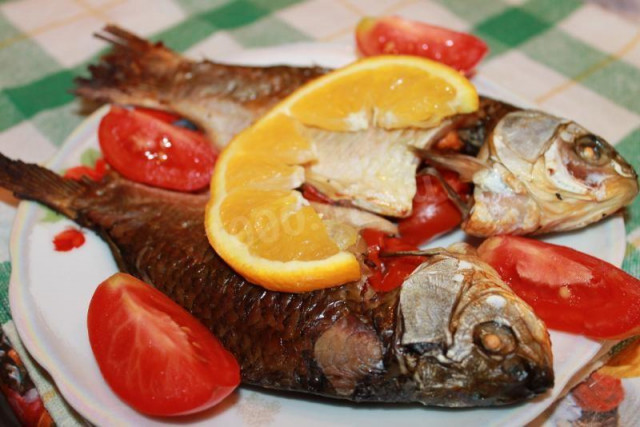 Crucian carp in sour cream with cherry and rosemary