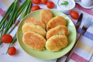 Classic potato patties in a frying pan