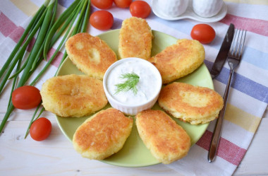 Classic potato patties in a frying pan