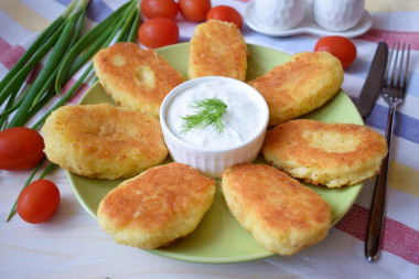 Classic potato patties in a frying pan