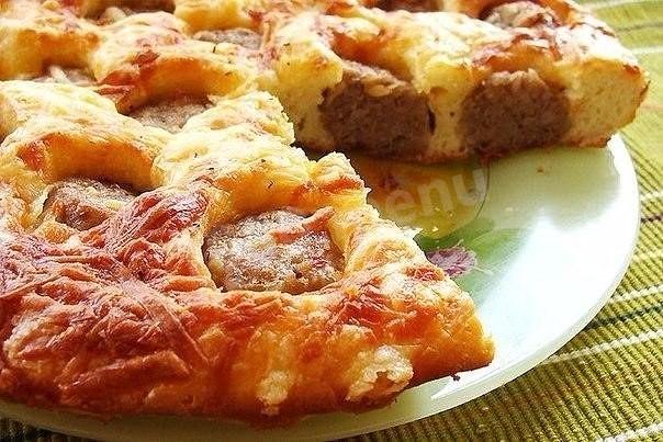 Pie with meatballs in the oven