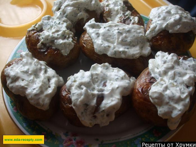 Peeled potatoes baked in the oven with mayonnaise