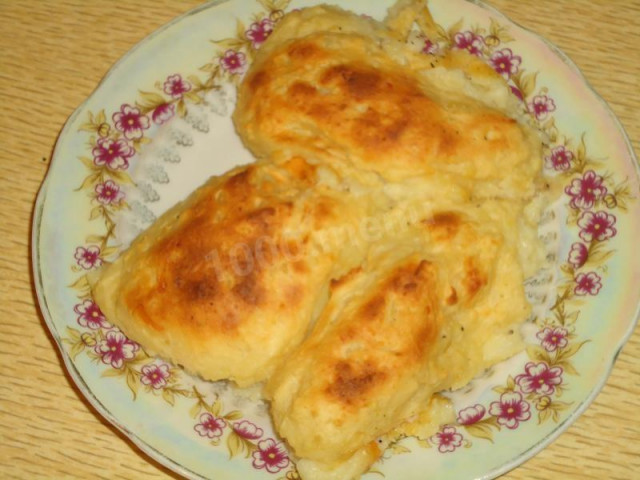 Potato patties with hard cheese in the oven