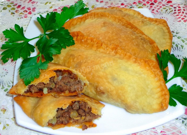 Chebureks with fried meat