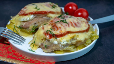 French pork meat with vegetables and cheese