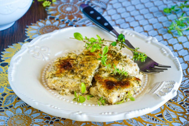 Casserole from fish fillet in cream with hard cheese