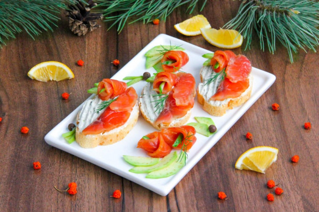 Sandwiches with avocado red fish and cottage cheese