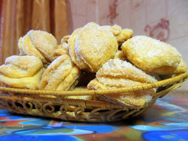 Triangles of cottage cheese dough with sugar