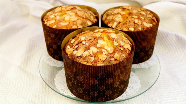 Italian cake with candied fruits and almond crust Panettone