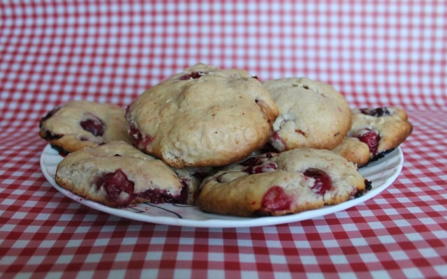 Homemade vanilla cookies on sour cream with cherries