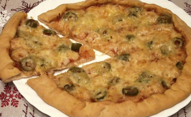 Pizza with shrimp and olives