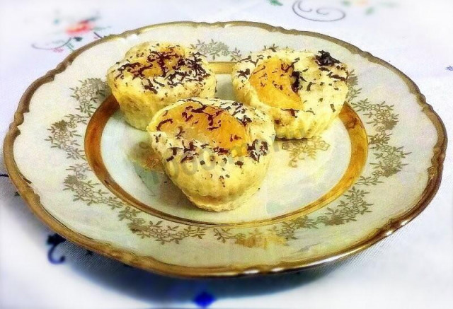 Oatmeal curd casserole with tangerines and chocolate