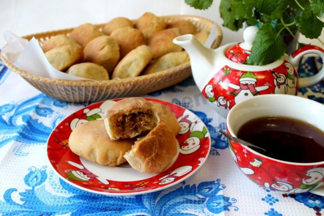 Pies with cabbage and meat made from milk dough without yeast