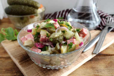 Salad with sausage, pickled cucumber and potatoes